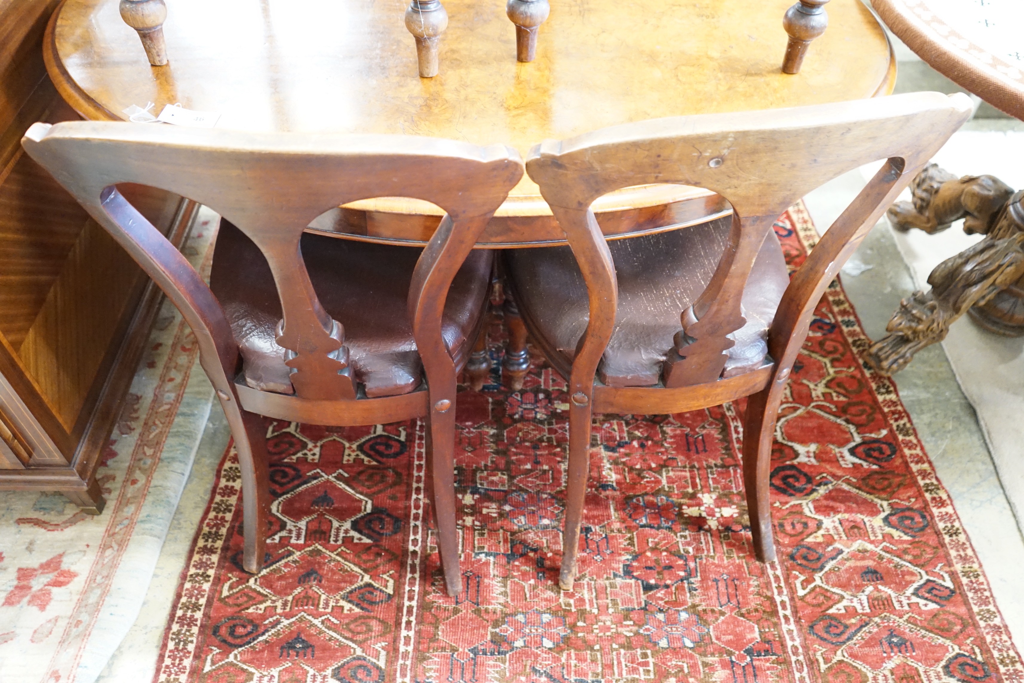 A set of six Victorian mahogany dining chairs